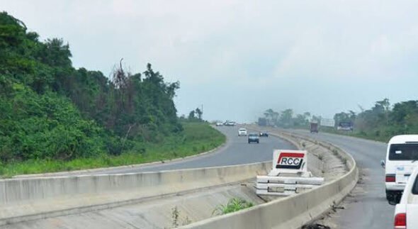 Traffic moves along the Kara Bridge on the Lagos-Ibadan Expressway during repair preparations.