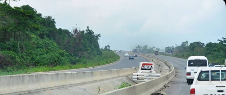 Traffic moves along the Kara Bridge on the Lagos-Ibadan Expressway during repair preparations.