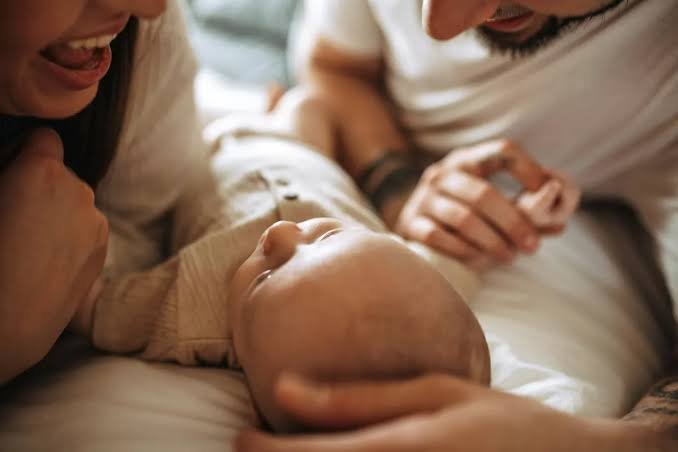 Parents with a newborn benefit from France's new paid parental leave policy.