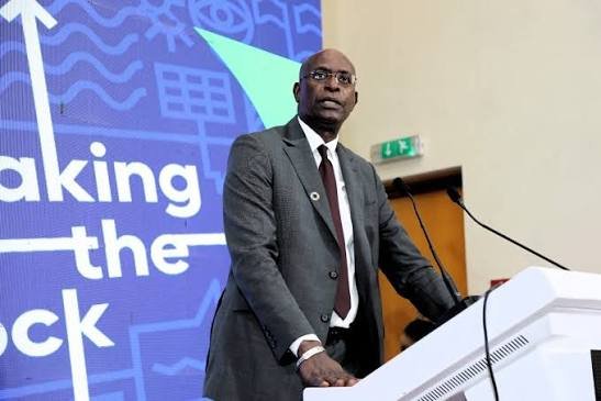 UN Resident Coordinator Mohammed Malick Fall addresses young participants at a health policy forum in Abuja.