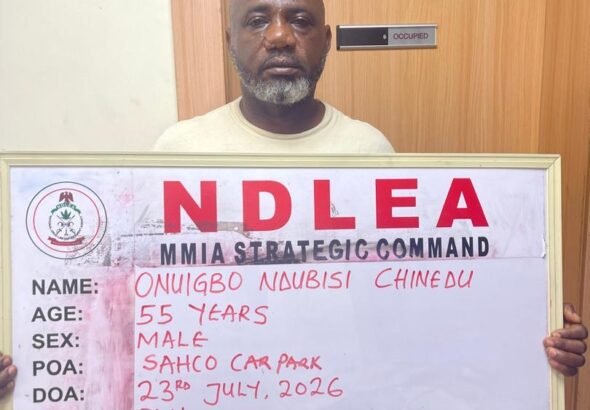 NDLEA operatives display cocaine, Loud, tramadol and other illicit drugs seized during coordinated operations in Lagos.