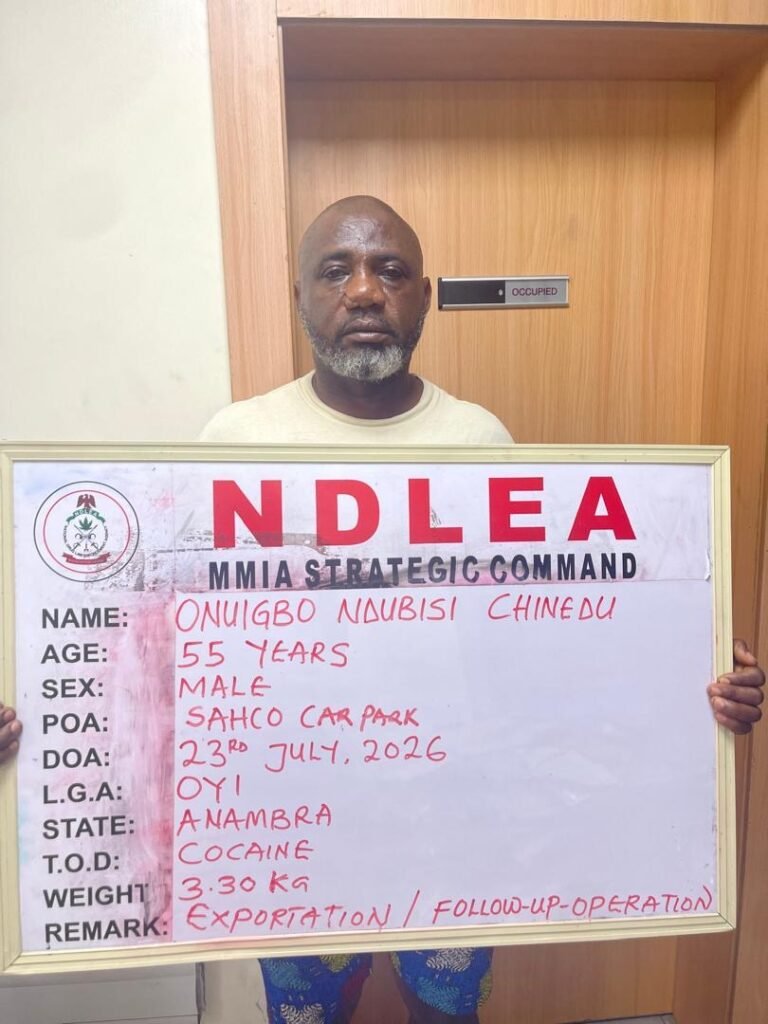 NDLEA operatives display cocaine, Loud, tramadol and other illicit drugs seized during coordinated operations in Lagos.