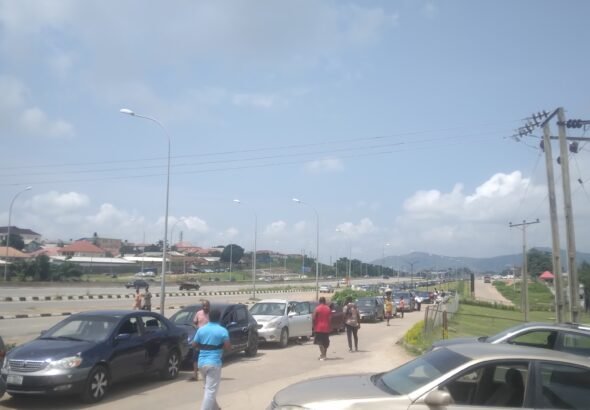 Cars on a queue to refuel their Cylinders at NIPCO refuelling gas station, Kubwa, Abuja.