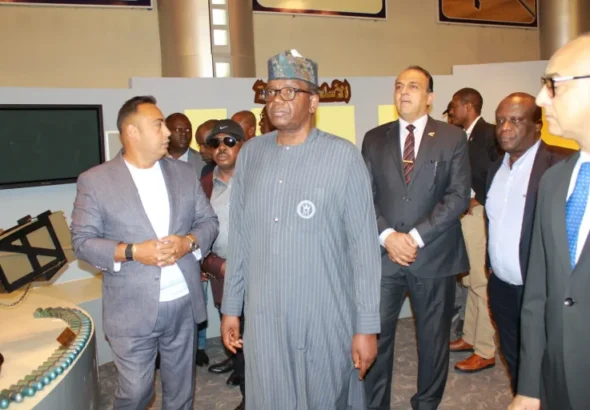 Minister of state for Defence, Bello Matawalle with Mr Osman Chennae.