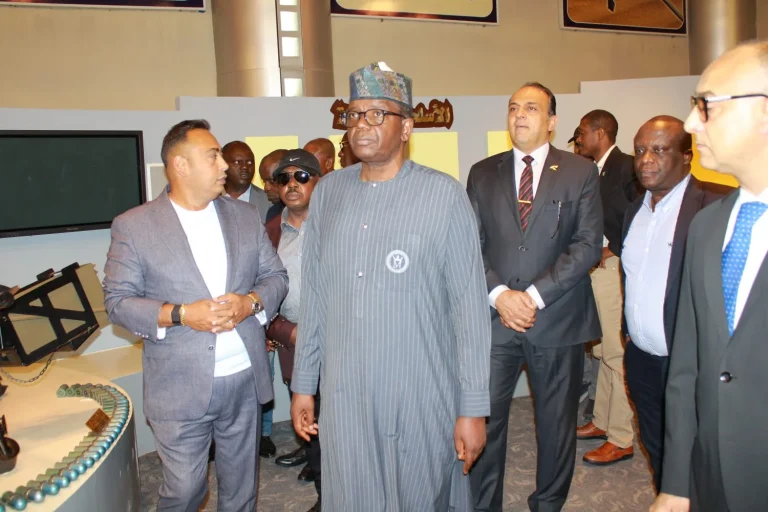 Minister of state for Defence, Bello Matawalle with Mr Osman Chennae.