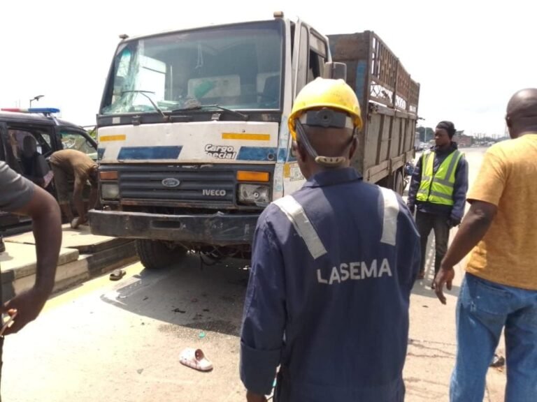 Emergency responders attend the scene of a fatal truck collision at Ijesha, Lagos.