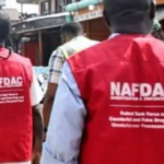 NAFDAC officials inspect alcoholic beverages during enforcement operations.