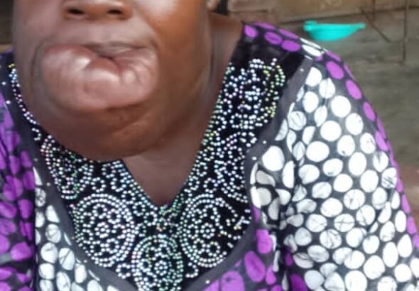 Deborah Ajibade, a Nigerian cancer patient, whose delayed cancer diagnosis and inability to afford treatment highlight the urgent need for earlier detection and accessible cancer care in Nigeria.