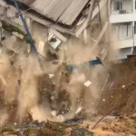 Hospital building collapses into an erosion gully after heavy rainfall in Calabar.