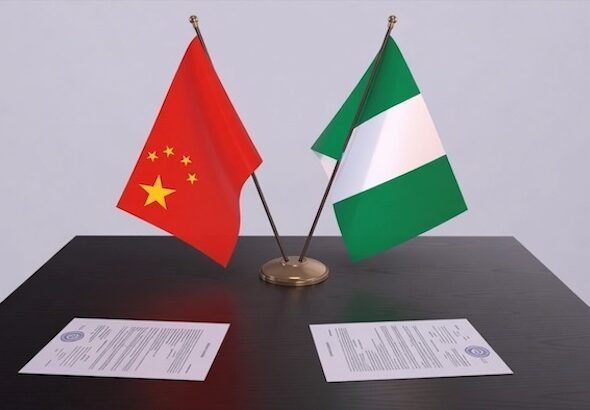 Chinese Ambassador Yu Dunhai meets Nigerian officials in Abuja to announce a development grant.