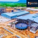 The official commissioning of the Nasarawa lithium processing plant with President Tinubu's representatives, the Solid Minerals Minister and the processing facility in the background.