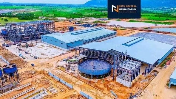 The official commissioning of the Nasarawa lithium processing plant with President Tinubu's representatives, the Solid Minerals Minister and the processing facility in the background.