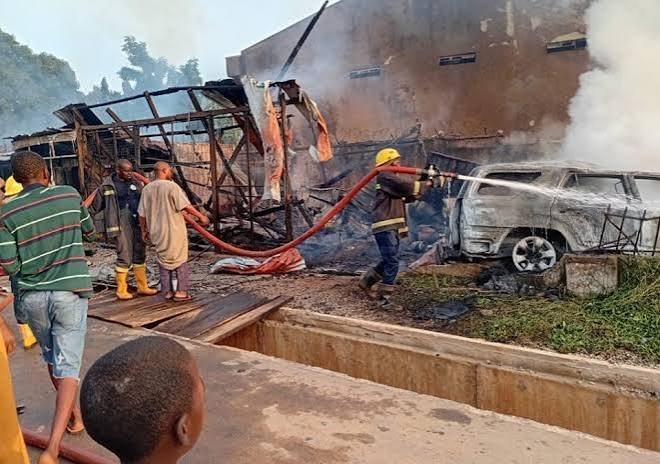 Firefighters respond after a car crashed into a gas store in Kubwa, Abuja