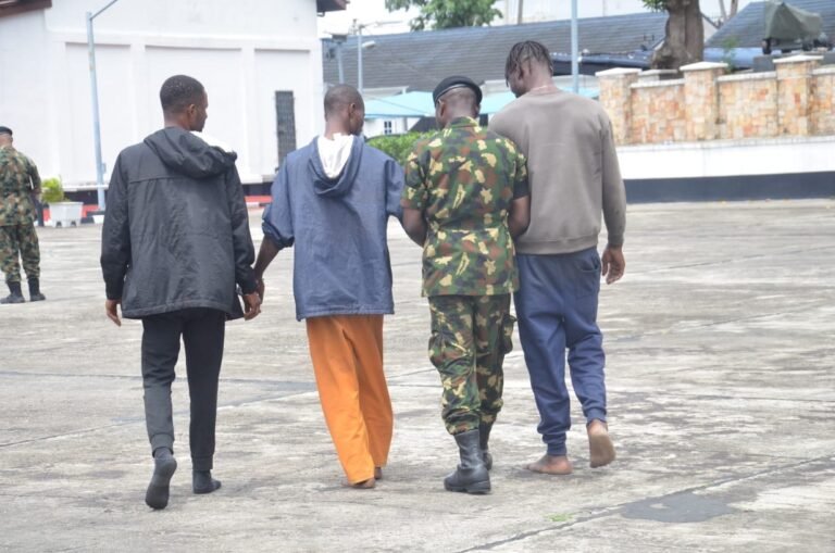 Nigerian Navy personnel intercept three suspected stowaways aboard a merchant vessel off Lagos