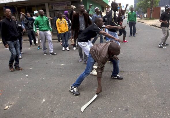 Nigerian returnees arrive in Lagos following evacuation from South Africa.