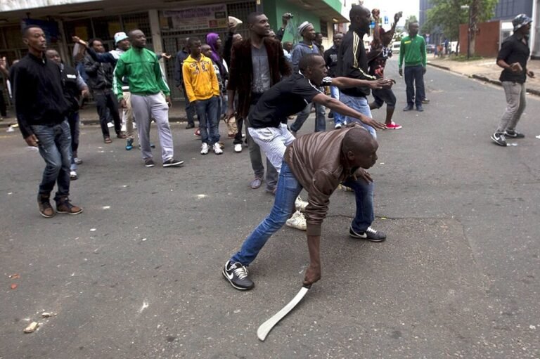 Nigerian returnees arrive in Lagos following evacuation from South Africa.