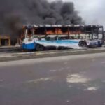 Charred remains of a BRT bus reportedly set ablaze after a fatal motorcycle crash at Ogolonto, Lagos.