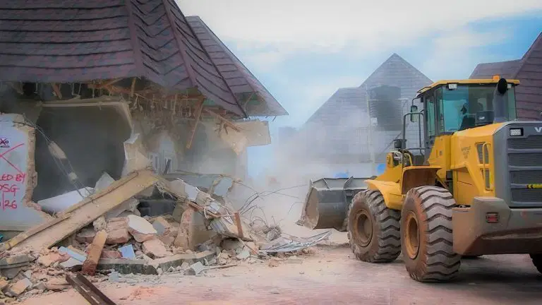 Building demolished by Edo State authorities during a security operation involving allegations of criminal activity.