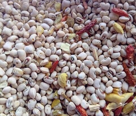 Beans and agricultural chemicals illustrating NAFDAC’s warning about pesticide