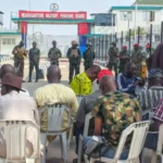Retired military personnel protest over the calculation of pension increases outside the Military Pensions Board office in Abuja.