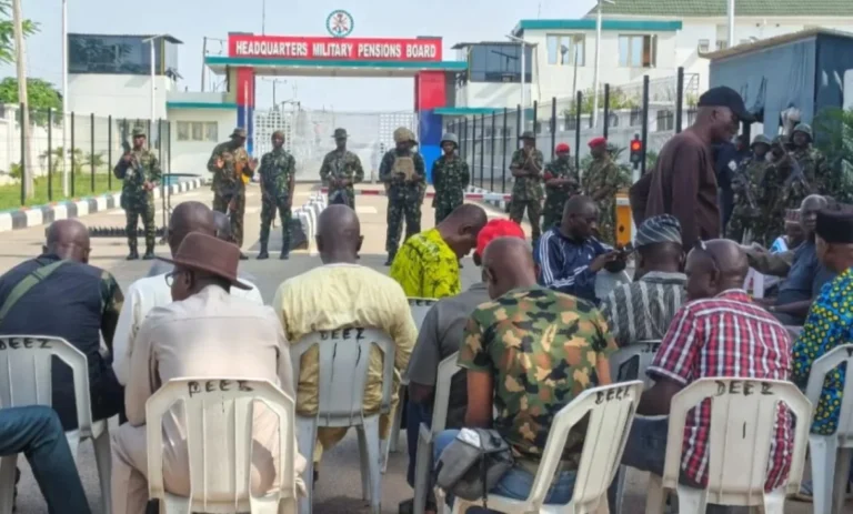 Retired military personnel protest over the calculation of pension increases outside the Military Pensions Board office in Abuja.