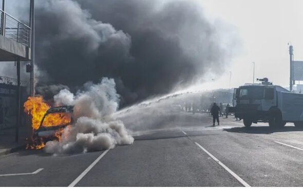 Burnt vehicles and damaged businesses amid xenophobic violence in South Africa