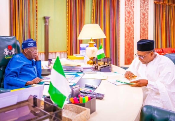 President Bola Tinubu and Health Minister Muhammad Ali Pate during an engagement on healthcare access and health sector reforms.