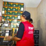 NAFDAC enforcement operation at the Lagos International Trade Fair Complex where suspected counterfeit alcoholic beverages and prohibited products were seized.